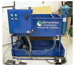 Custom oil and water separator with fluid transfer tank