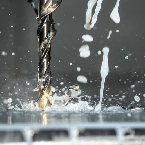 Water-soluble coolant applied during metal machining