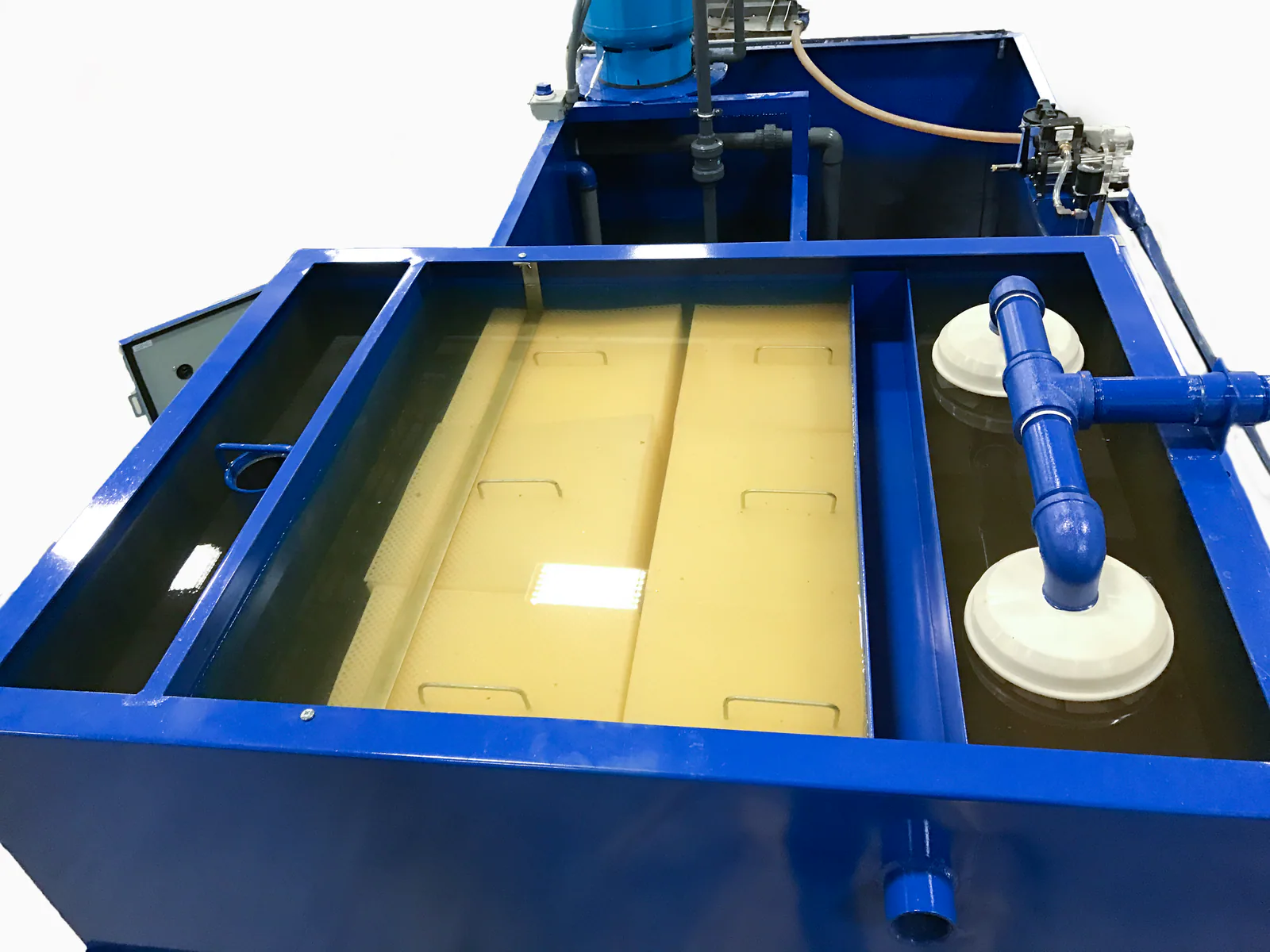 Open C.R.O.S.S. system showing internal tanks and fluid separation area